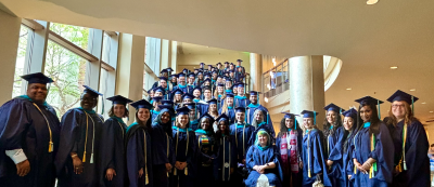 The class of 2024 on the stairs of the Bushnell